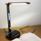 LED table lamp with wireless charging station and calendar display 