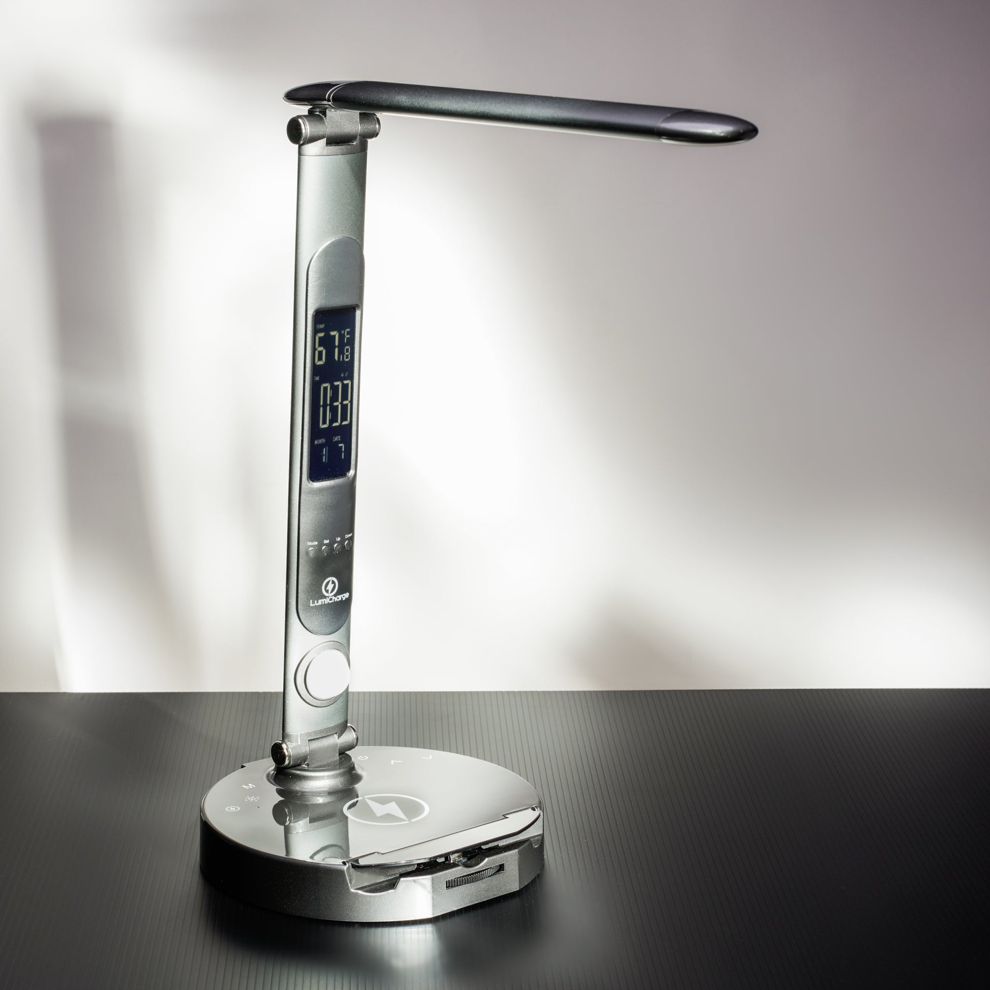 LED table lamp with wireless charging station and calendar display 